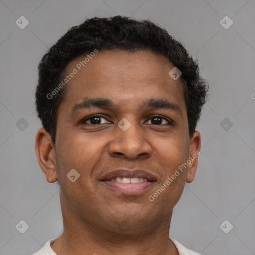 Joyful latino young-adult male with short  brown hair and brown eyes