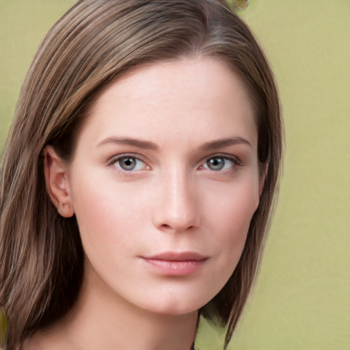 Neutral white young-adult female with long  brown hair and grey eyes