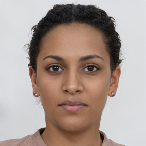 Neutral latino young-adult female with short  brown hair and brown eyes