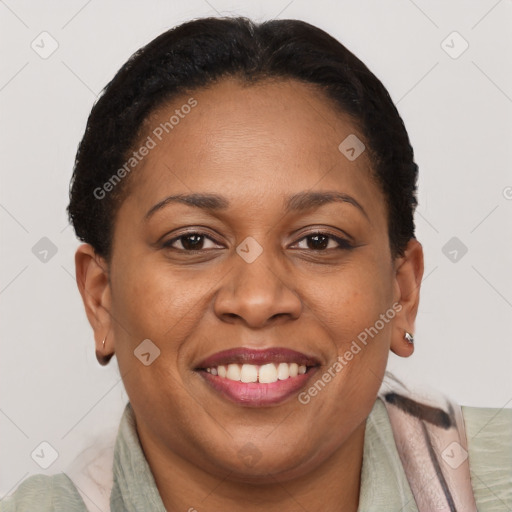 Joyful latino adult female with short  brown hair and brown eyes