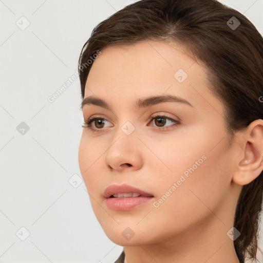 Neutral white young-adult female with long  brown hair and brown eyes