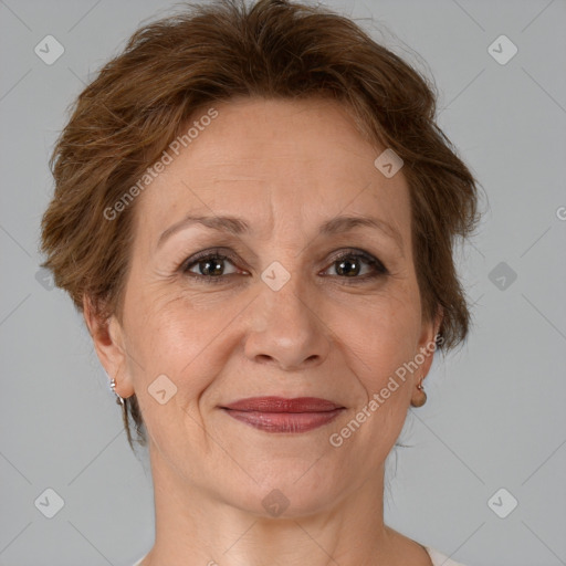 Joyful white adult female with short  brown hair and brown eyes