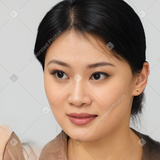 Joyful asian young-adult female with long  brown hair and brown eyes