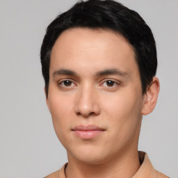 Neutral white young-adult male with short  black hair and brown eyes