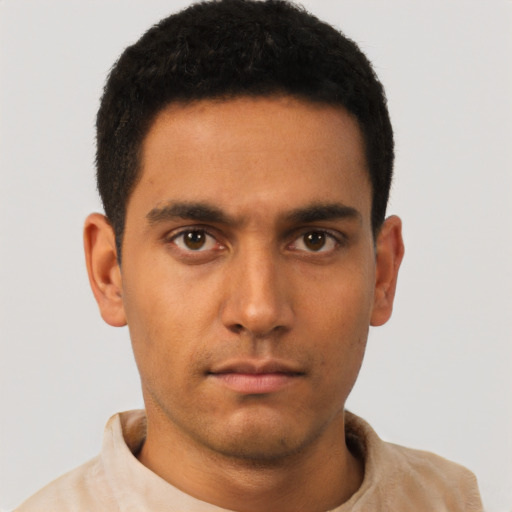 Neutral latino young-adult male with short  brown hair and brown eyes