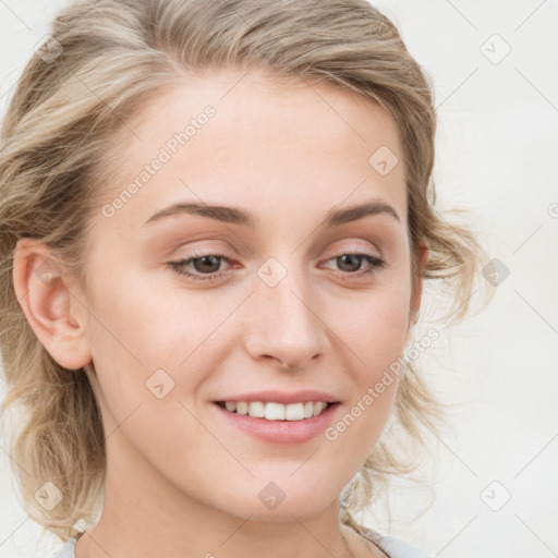 Joyful white young-adult female with long  brown hair and blue eyes