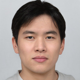 Neutral asian young-adult male with short  brown hair and brown eyes