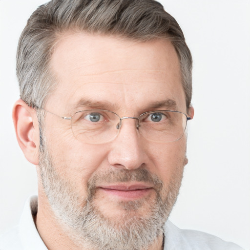 Joyful white middle-aged male with short  brown hair and grey eyes