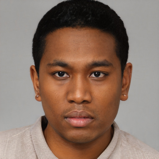 Neutral black young-adult male with short  black hair and brown eyes