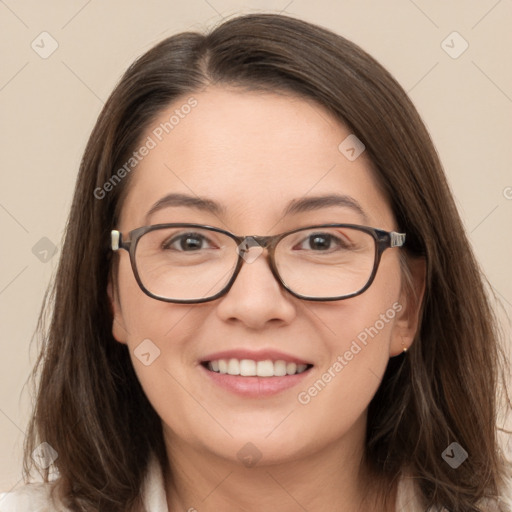 Joyful white young-adult female with long  brown hair and brown eyes