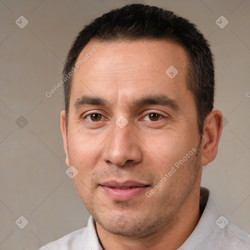 Joyful white young-adult male with short  black hair and brown eyes