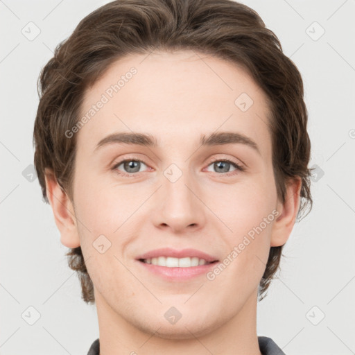 Joyful white young-adult female with short  brown hair and grey eyes