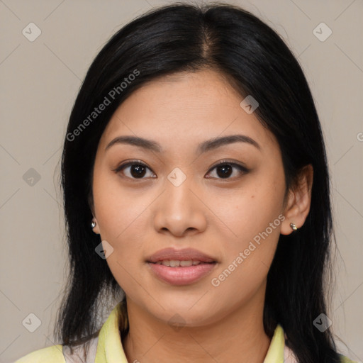 Joyful asian young-adult female with medium  black hair and brown eyes