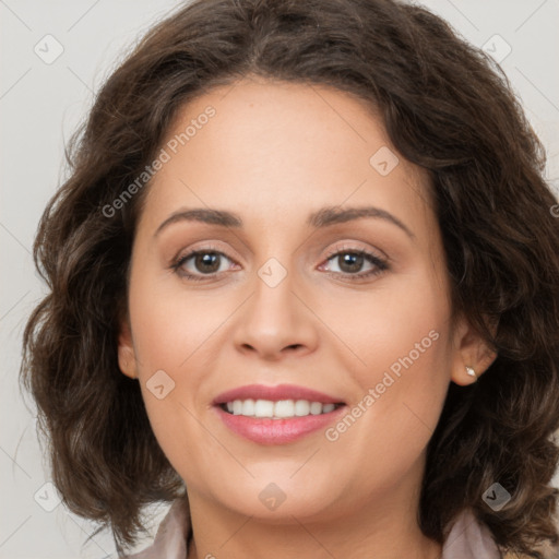 Joyful white young-adult female with long  brown hair and green eyes