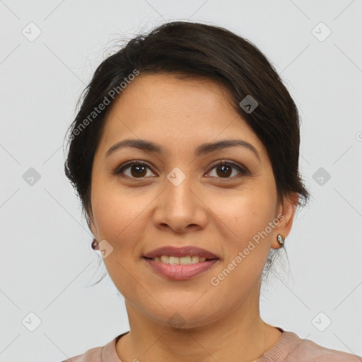 Joyful latino young-adult female with long  brown hair and brown eyes