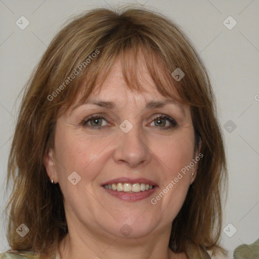 Joyful white adult female with medium  brown hair and grey eyes