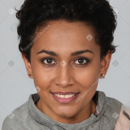 Joyful black young-adult female with short  brown hair and brown eyes