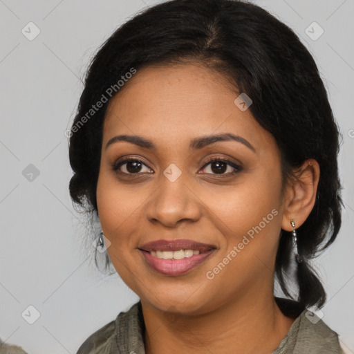 Joyful latino young-adult female with long  brown hair and brown eyes