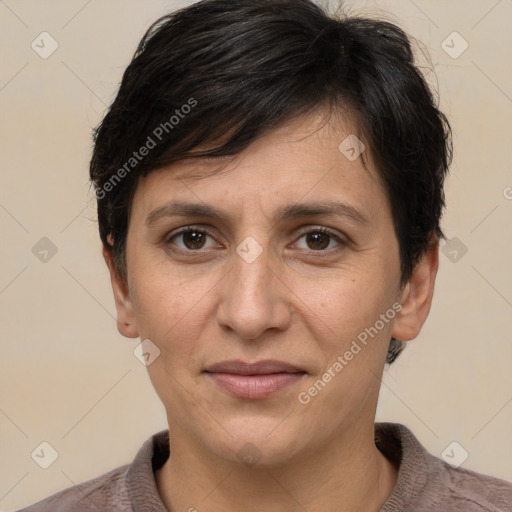 Joyful white adult female with short  brown hair and brown eyes