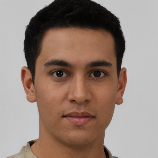 Neutral latino young-adult male with short  brown hair and brown eyes