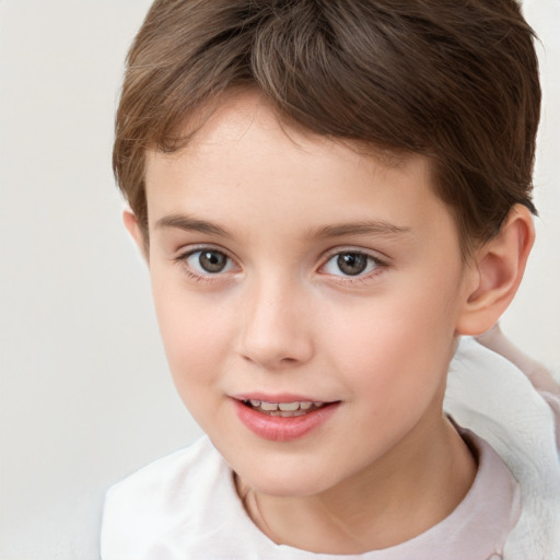 Joyful white child female with short  brown hair and brown eyes