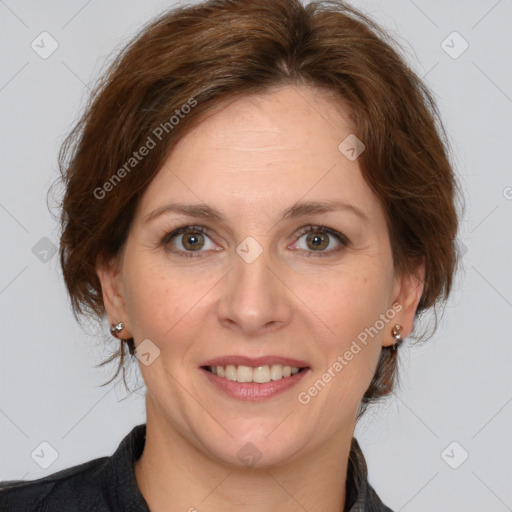 Joyful white adult female with medium  brown hair and grey eyes