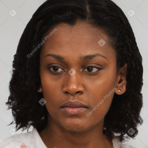 Neutral black young-adult female with medium  black hair and brown eyes