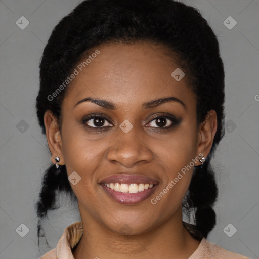 Joyful black young-adult female with medium  brown hair and brown eyes