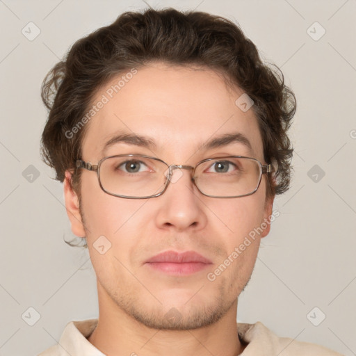 Joyful white adult male with short  brown hair and grey eyes