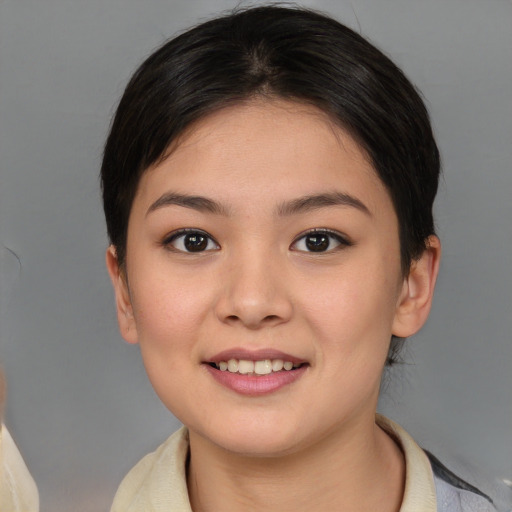 Joyful white young-adult female with medium  brown hair and brown eyes