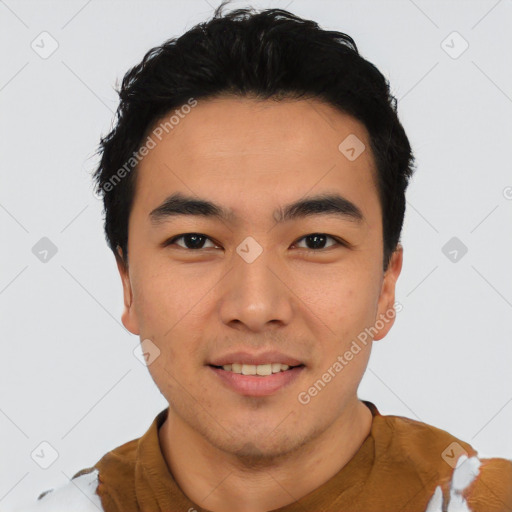 Joyful asian young-adult male with short  black hair and brown eyes