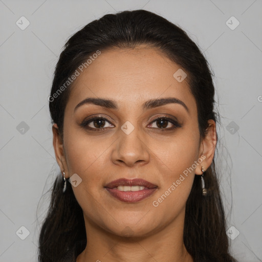 Joyful latino young-adult female with long  brown hair and brown eyes