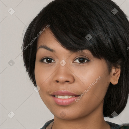 Joyful latino young-adult female with long  black hair and brown eyes