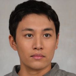 Neutral asian young-adult male with short  brown hair and brown eyes