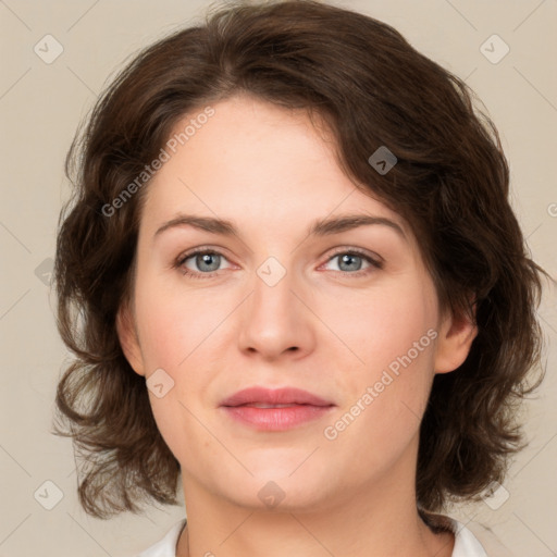 Joyful white young-adult female with medium  brown hair and green eyes