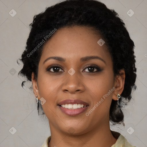 Joyful black young-adult female with medium  brown hair and brown eyes