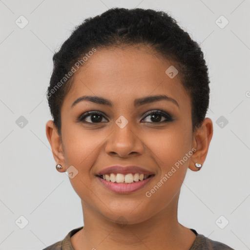 Joyful latino young-adult female with short  brown hair and brown eyes