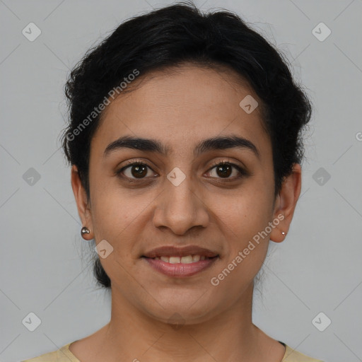 Joyful latino young-adult female with short  brown hair and brown eyes