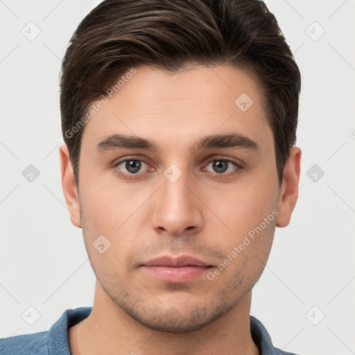 Neutral white young-adult male with short  brown hair and brown eyes