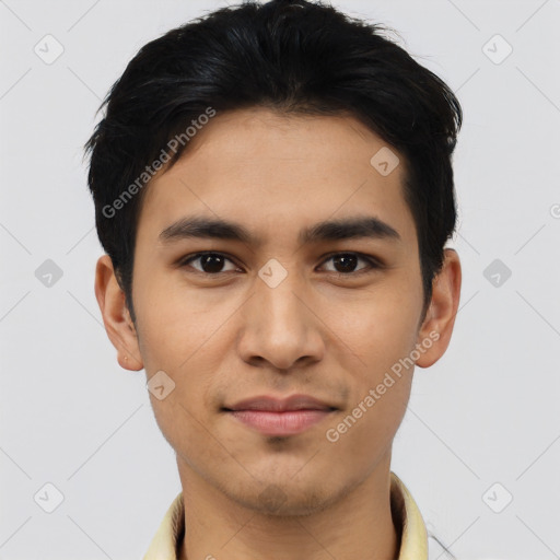 Joyful asian young-adult male with short  black hair and brown eyes