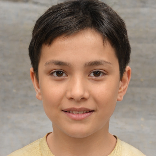 Joyful white child female with short  brown hair and brown eyes