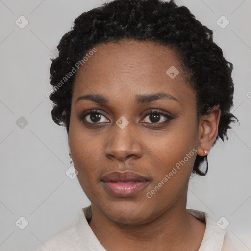 Neutral black young-adult female with short  black hair and brown eyes