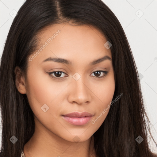 Joyful latino young-adult female with long  brown hair and brown eyes