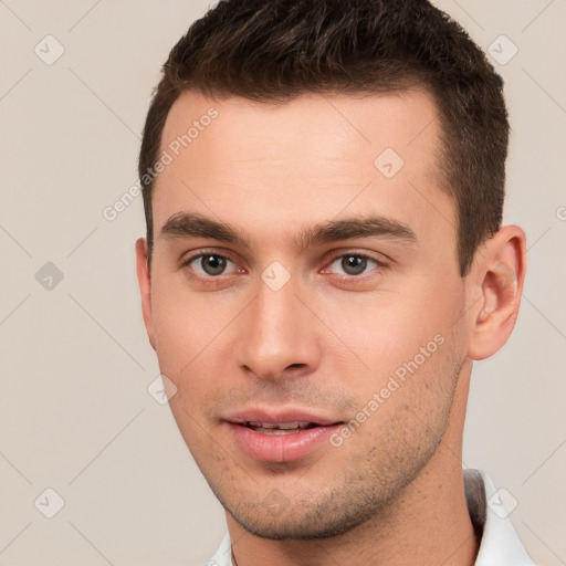 Neutral white young-adult male with short  brown hair and brown eyes