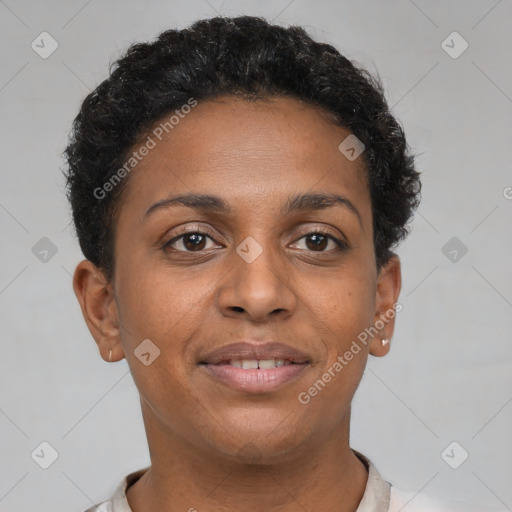 Joyful black young-adult female with short  brown hair and brown eyes