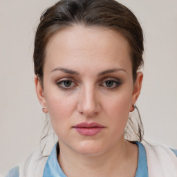 Neutral white young-adult female with medium  brown hair and grey eyes