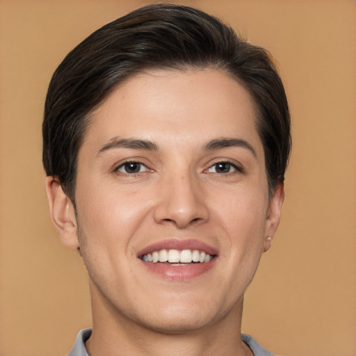 Joyful white young-adult male with short  brown hair and brown eyes