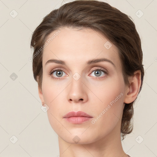 Neutral white young-adult female with medium  brown hair and green eyes