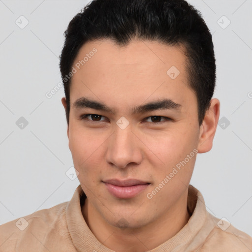 Joyful asian young-adult male with short  brown hair and brown eyes