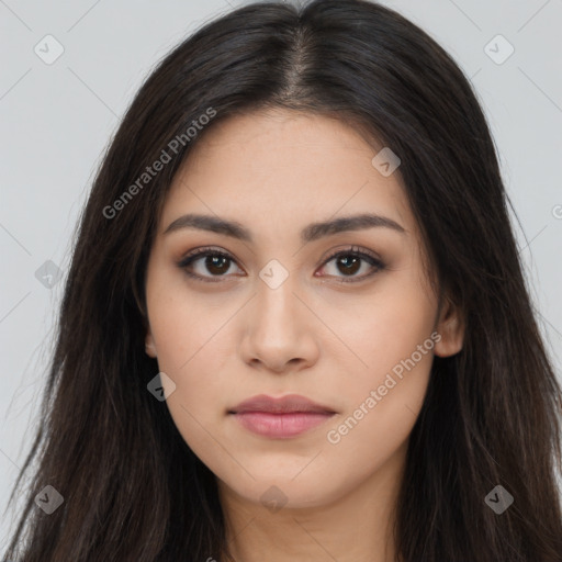 Neutral latino young-adult female with long  brown hair and brown eyes